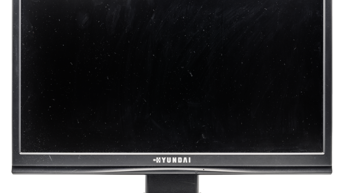 Computer monitor photographed against a dark background