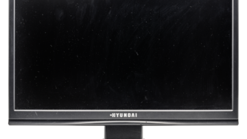 Computer monitor photographed against a dark background