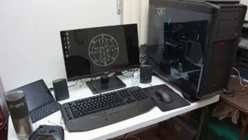 Desktop gaming PC with monitor, keyboard and mouse used to illustrate refresh-rate troubleshooting