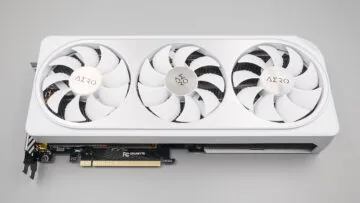 White triple-fan GeForce RTX 4070 graphics card showing its PCI Express connector